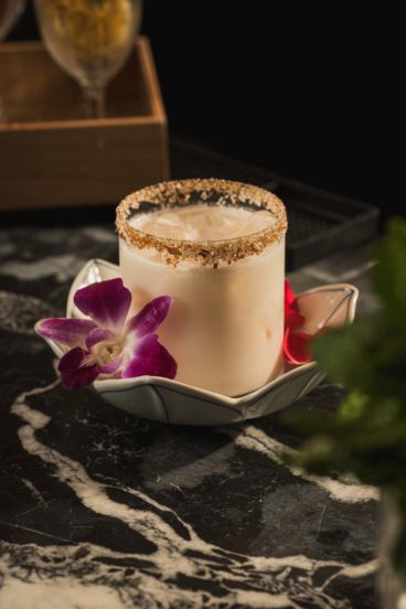 The Loy Krathong Breeze is a coconutty, zero-proof cocktail at Savor, a new Thai restaurant in Toronto