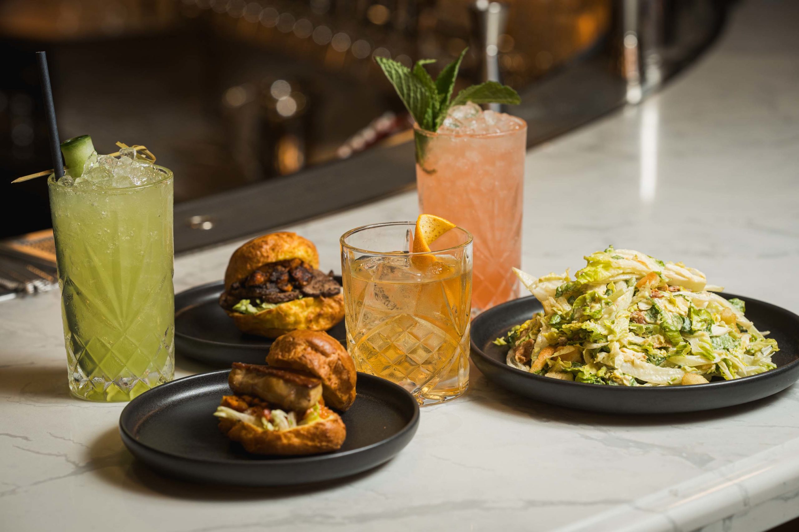A selection of sandwiches, salads and drinks from In Good Spirits, a bar inside CIBC Square's new food hall
