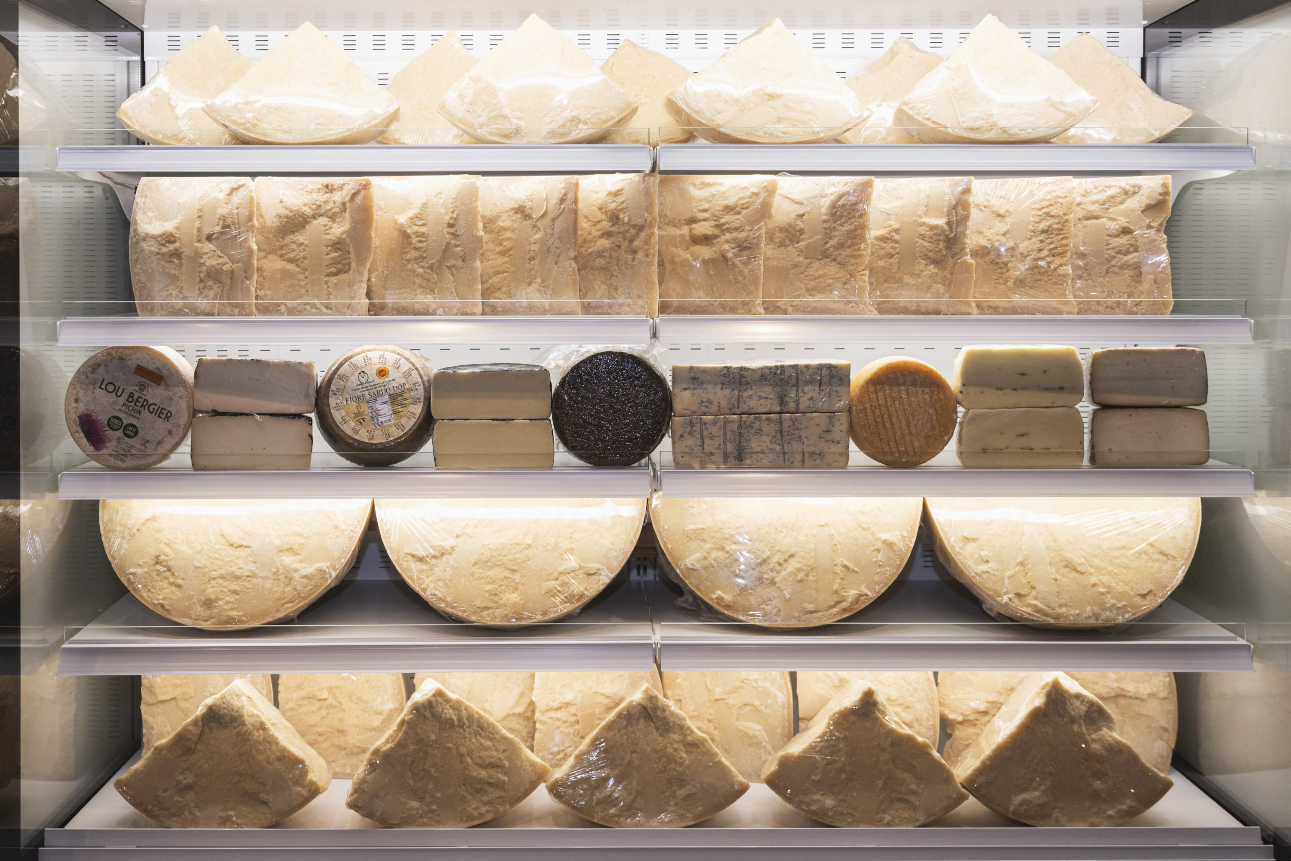 The cheese fridge at Eataly is stocked with all kinds of Italian-imported products