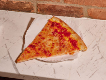 A classic, foldable slice of Prince Street Pizza's NY-style cheese pizza